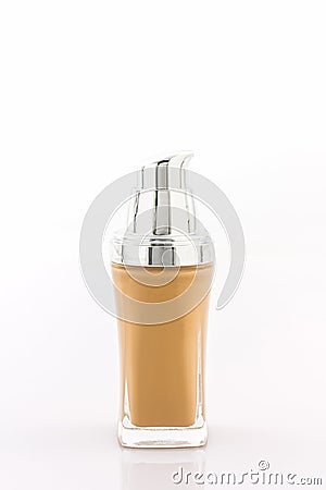 Beige make up foundation in luxurious bottle. Stock Photo