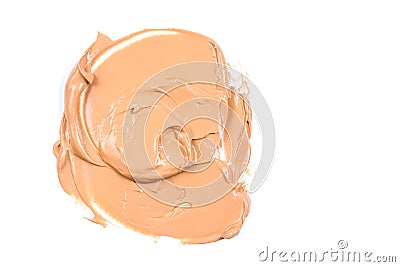 Beige makeup smear of creamy foundation on white background. Light beige creamy foundation. Isolated Stock Photo