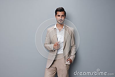 beige man businessman smiling person handsome suit happy copyspace portrait business Stock Photo