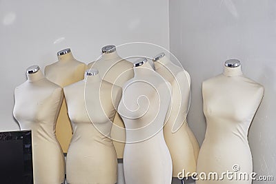 Beige mannequin on the background of the white wall Stock Photo