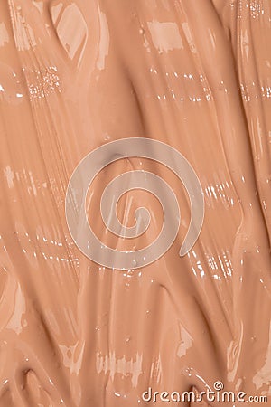 Beige nude liquid foundation texture, concealer smear smudge drop. Closeup macro. Cosmetic tonal makeup moisturizer, bb cream Stock Photo