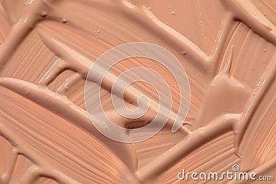 Beige nude liquid foundation texture, concealer smear smudge drop. Closeup macro. Cosmetic tonal makeup moisturizer, bb cream Stock Photo