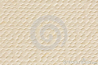 Beige paper stamping texture. Kraft paper with vertical lines, macro shot. Stock Photo