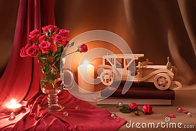 Beige pink still life with roses, candles and vintage car Stock Photo