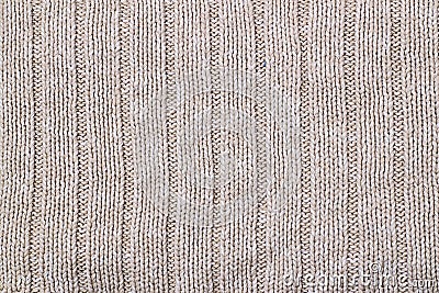 Beige texture of knitted wool sweater. Hand knitting. Knit and purl stitch pattern Stock Photo