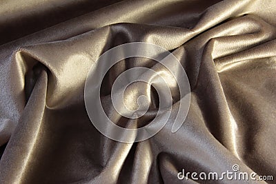 Beige velour with pleats. Drapery on plush fabric Stock Photo