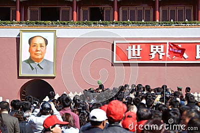 Crowds of tourists entering the Forbidden City under the gaze of Editorial Stock Photo