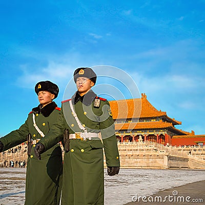 Unidentified Chinese military guards patrol on the courtyard of Taihedian Hall of Supreme Harmony Editorial Stock Photo