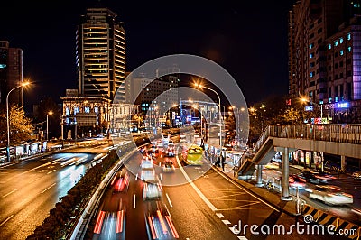 Beijing at night, driving cars on a busy road in the city Editorial Stock Photo
