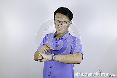 Being late to work and deadline, Young asian man is time delay and late on project. Executive angry, hurry, stress, frustrated Stock Photo
