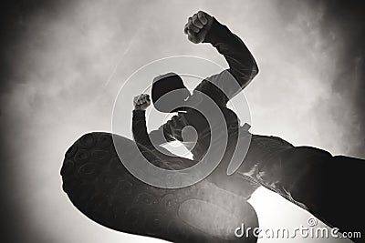 Being punched and mugged by aggressive violent man on street Stock Photo