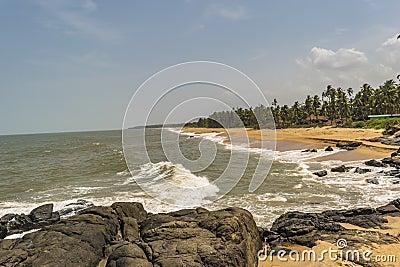 Rocky beach facing Waves - Bekal Stock Photo