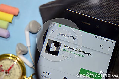 Microsoft Booking dev app with magnifying on Smartphone screen Editorial Stock Photo