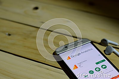 Google Analytics dev application on Smartphone screen. Editorial Stock Photo