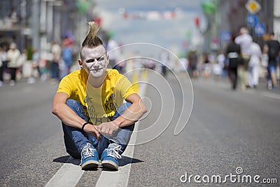 Youth Festival.Punk in bright clothes on a city street Editorial Stock Photo