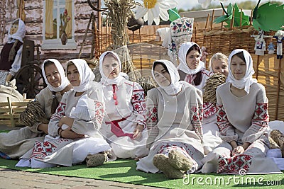 Young Ukrainian or Belarusian girls in embroidered shirts Editorial Stock Photo