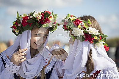 Young Ukrainian or Belarusian girls in an embroidered shirt Editorial Stock Photo