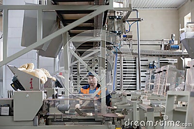 Robotic bread making line. Editorial Stock Photo