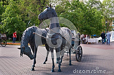 Belarus. Minsk. Monument Crew. Two horses with a cart. May 21, 2017 Editorial Stock Photo