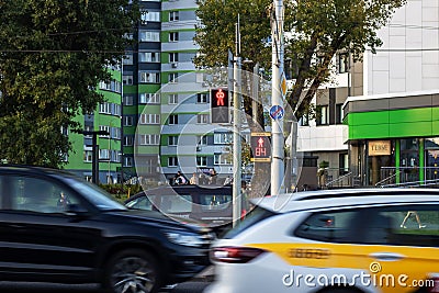 Belarus, Minsk - 20 september, 2023: Cars on road and pedestrian traffic light Editorial Stock Photo