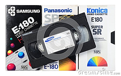 Various brands of VHS video cassettes wrappers. SAMSUNG PANASONIC KONICA. Various VHS video cassettes. Editorial Stock Photo