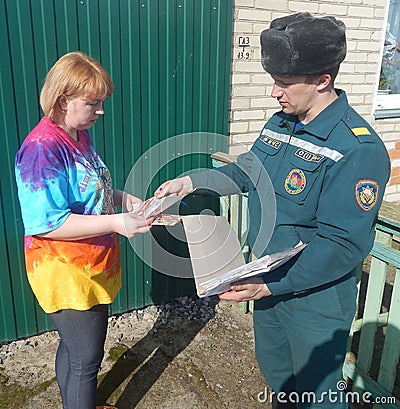 Belarusian firefighters inspect private homes for fire safety In the Gomel region. Editorial Stock Photo