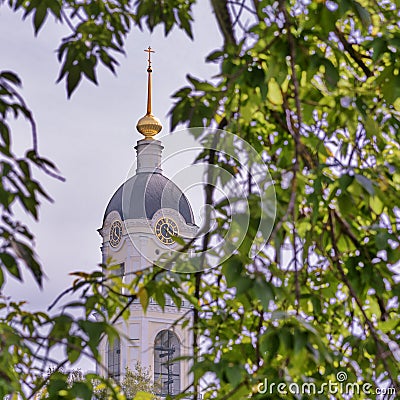 Belfry of Holy Dormition man`s monastery Sarovskaya Pustyn`. Autumn day landscape Stock Photo