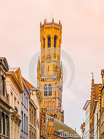 The Belfry Tower, aka Belfort, of Bruges, medieval bell tower in the historical centre of Bruges, Belgium. Close-up view Stock Photo