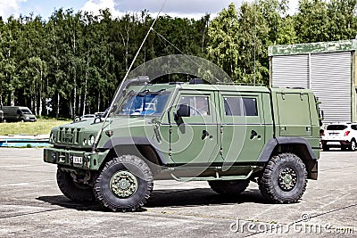 Belgian Army Iveco LMV (Light Multirole Vehicle) on guard at Beauvechain Air Base. Beauvechain, Beligum - May 20, 2015 Editorial Stock Photo