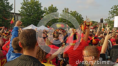 Belgian football fans celebrating a scored goal during a match Editorial Stock Photo