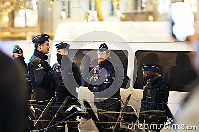 Belgian policemen at night Editorial Stock Photo