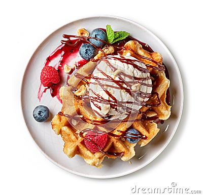 Belgian waffle with ice cream and fresh berries Stock Photo