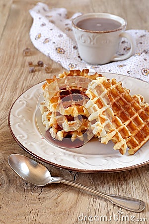 Belgian waffles with syrup and a cup of cocoa Stock Photo