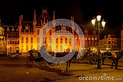 Belgium, Bruges, Belfry of Bruges, horse drawn carriage Editorial Stock Photo