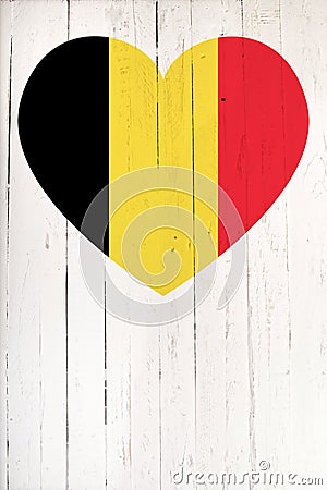 Belgium flag in heart shape on a white wooden board Stock Photo