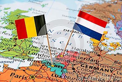 Belgium and Netherlands flags on map Stock Photo