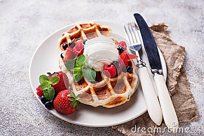 Belgium waffles with berries and ice cream Stock Photo