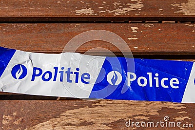 Belgium, warning tape with Belgian police text in French in Flemish Editorial Stock Photo
