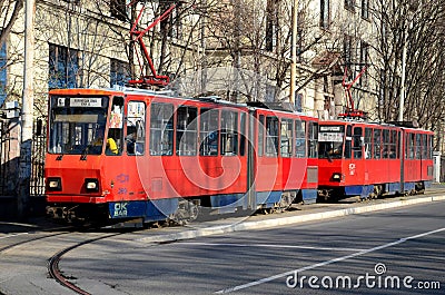 Belgrade red tram trolley carriages in sunlight Serbia Editorial Stock Photo