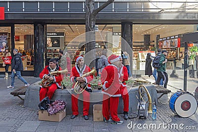 Santa Claus Musicians Editorial Stock Photo