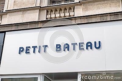 Logo and sign of Petit Bateau Editorial Stock Photo