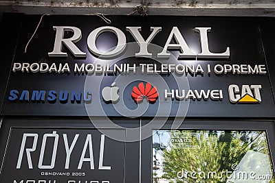 BELGRADE, SERBIA - MAY 21, 2023: Front store of a mobile phone shop of belgrade with the logo of several smartphone manufacturers Editorial Stock Photo