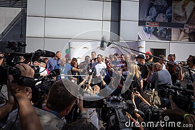 Sinisa Mali talking to a crowdof journalists during the Belgrade Gay Pride. Editorial Stock Photo