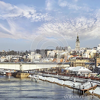 Belgrade Winter Panorama with Sava River Promenade at Savamala area with Branko`s bridge and St. Michael`s Bell Tower Stock Photo