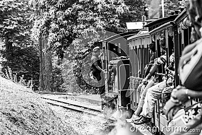 Belgrave, Victoria, Australia - January 7, 2009: Puffing Billy steam train with passengers. Historical narrow railway. Editorial Stock Photo