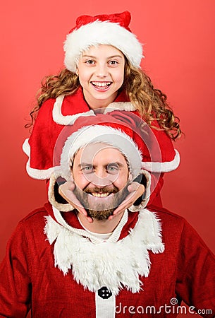 Belief in santa constitutes most magical part of childhood. My dad is santa claus. Girl little cute child and bearded Stock Photo