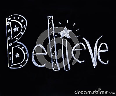 Believe written in chalk Stock Photo