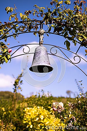 Bell hanging a hoop in the garden Stock Photo