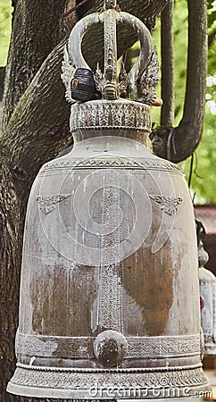 A bell hanging on the tree. Stock Photo