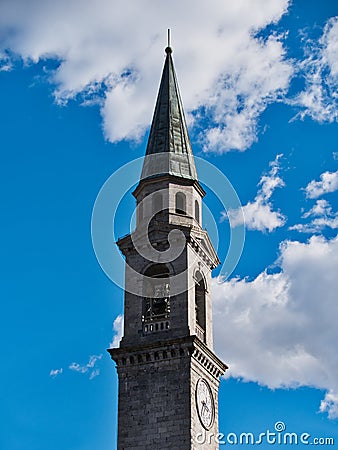 Bell tower church pinzolo Italy against cloudy blue sky Stock Photo